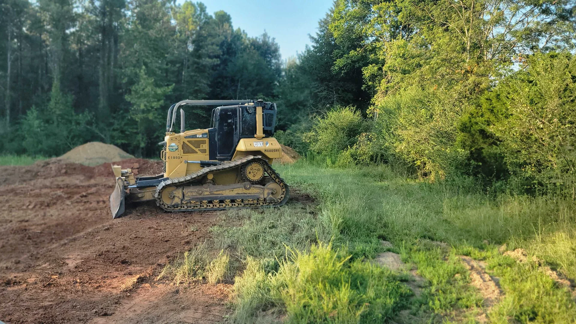 Precision Excavation dozer on freshly cleared and graded land in North Alabama