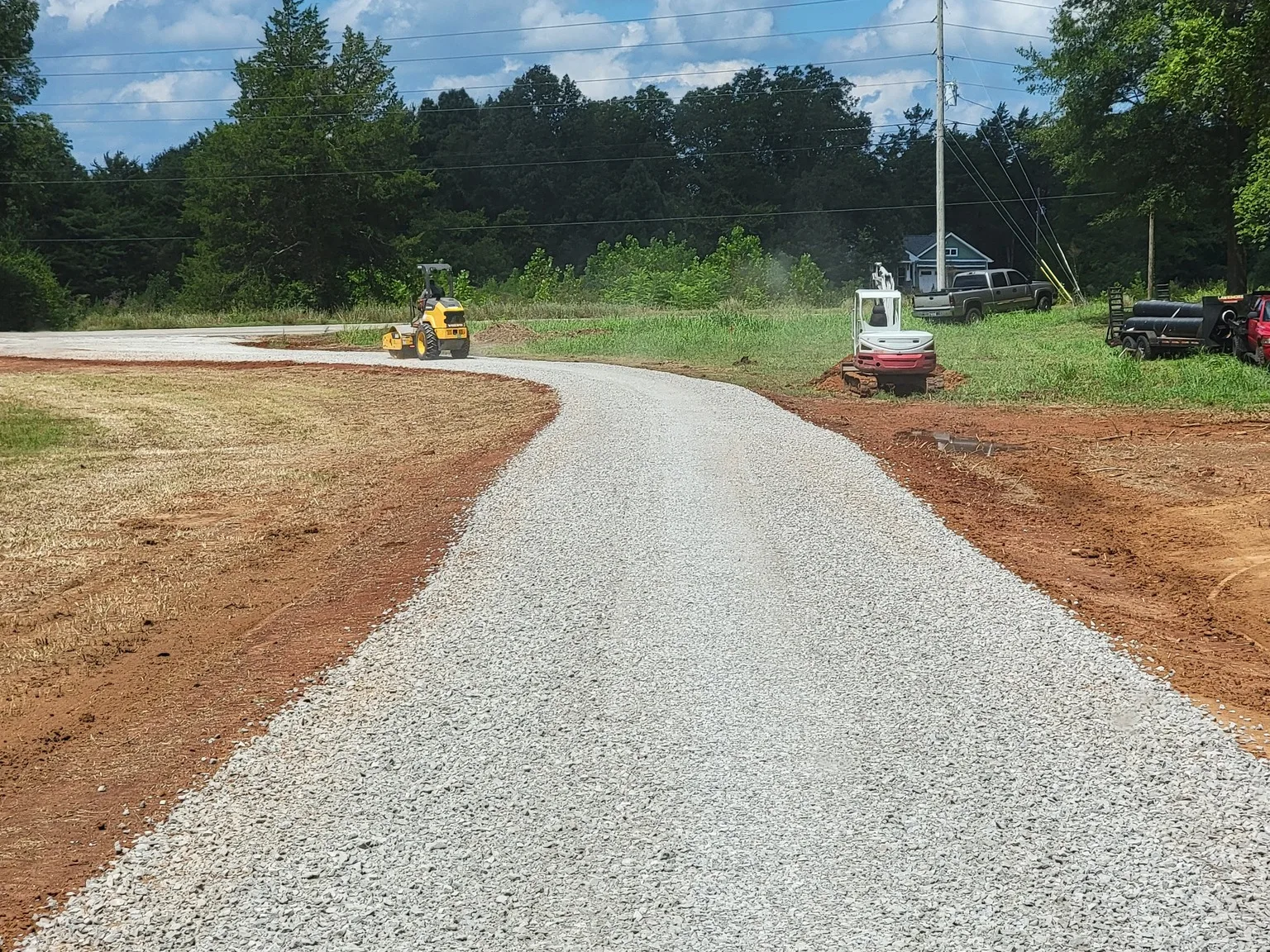 Gravel driveway laid and shaped